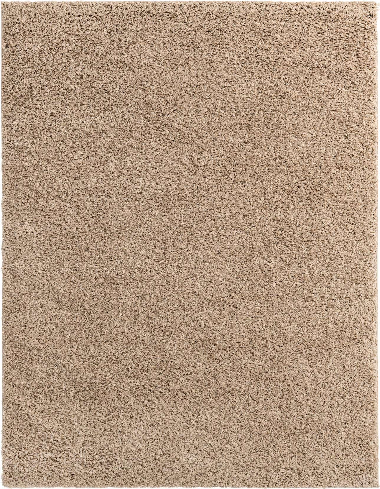 A rectangular 6x9 brown and tan shag rug with a textured, plush pile, ideal for a living room or bedroom.