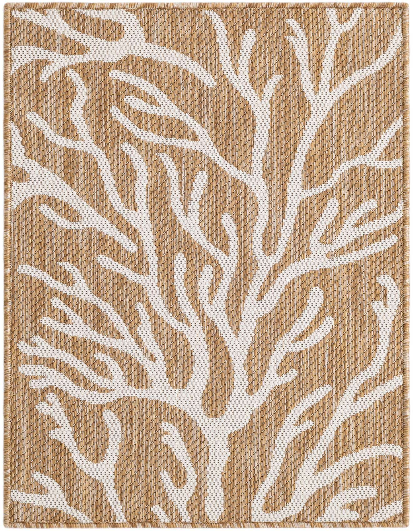 A 2x3 rectangular indoor/outdoor rug featuring a modern coastal coral pattern in ivory against a tan flatweave background.