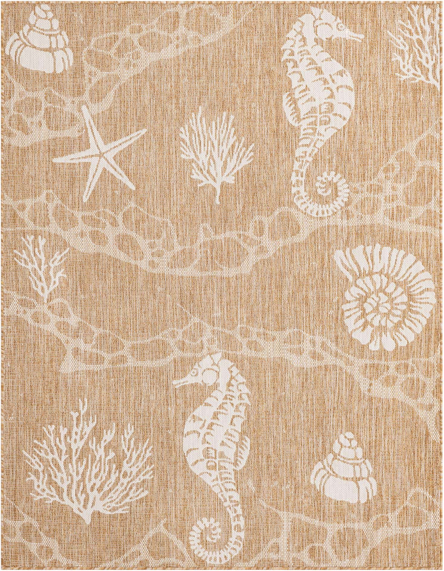 A 5x7 rectangular indoor/outdoor rug with a tan background and white beach-themed patterns including seahorses, starfish, shells, and coral.
