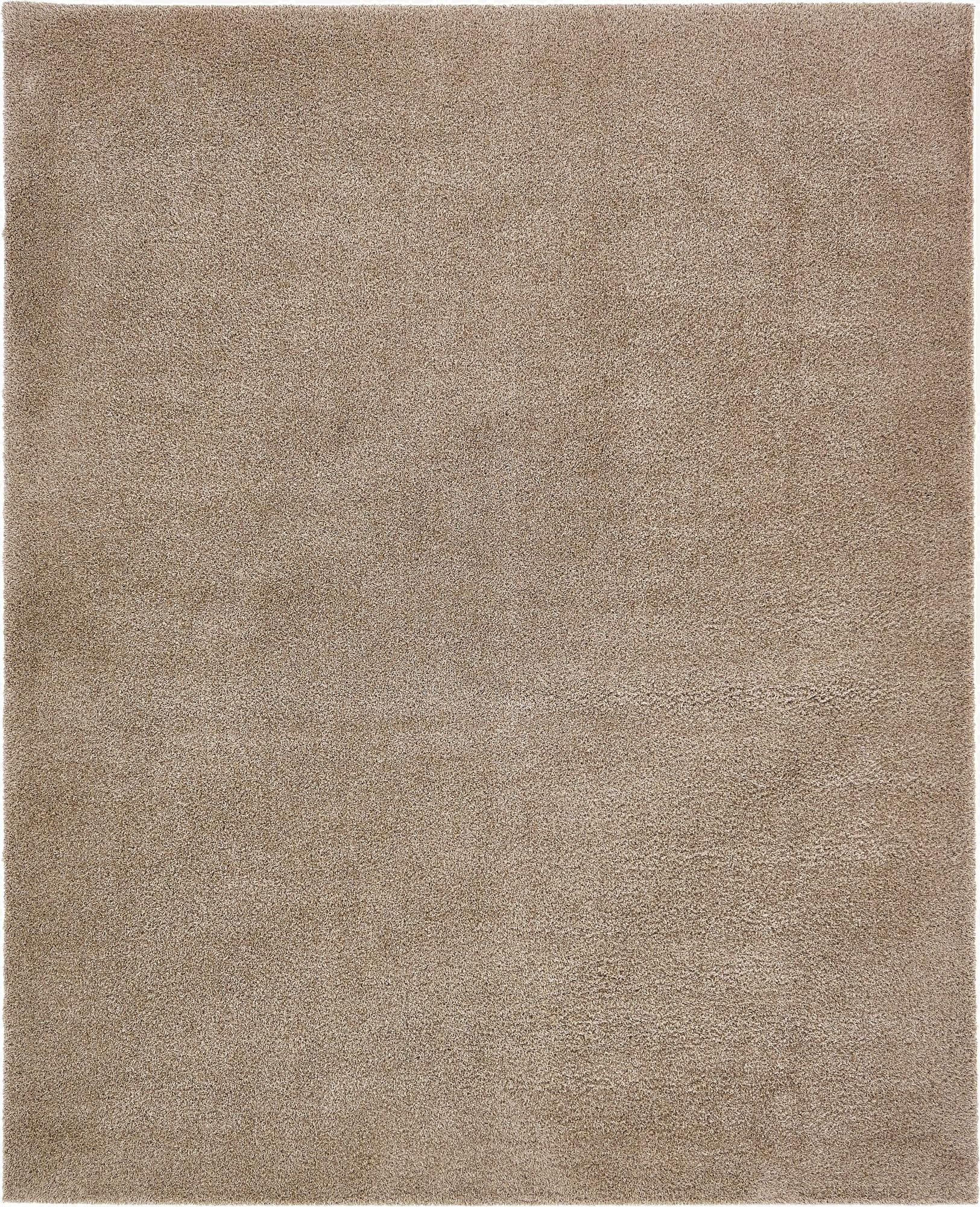 A soft, rectangular 8x10 brown shag rug, ideal for adding warmth and comfort to a living room or bedroom.