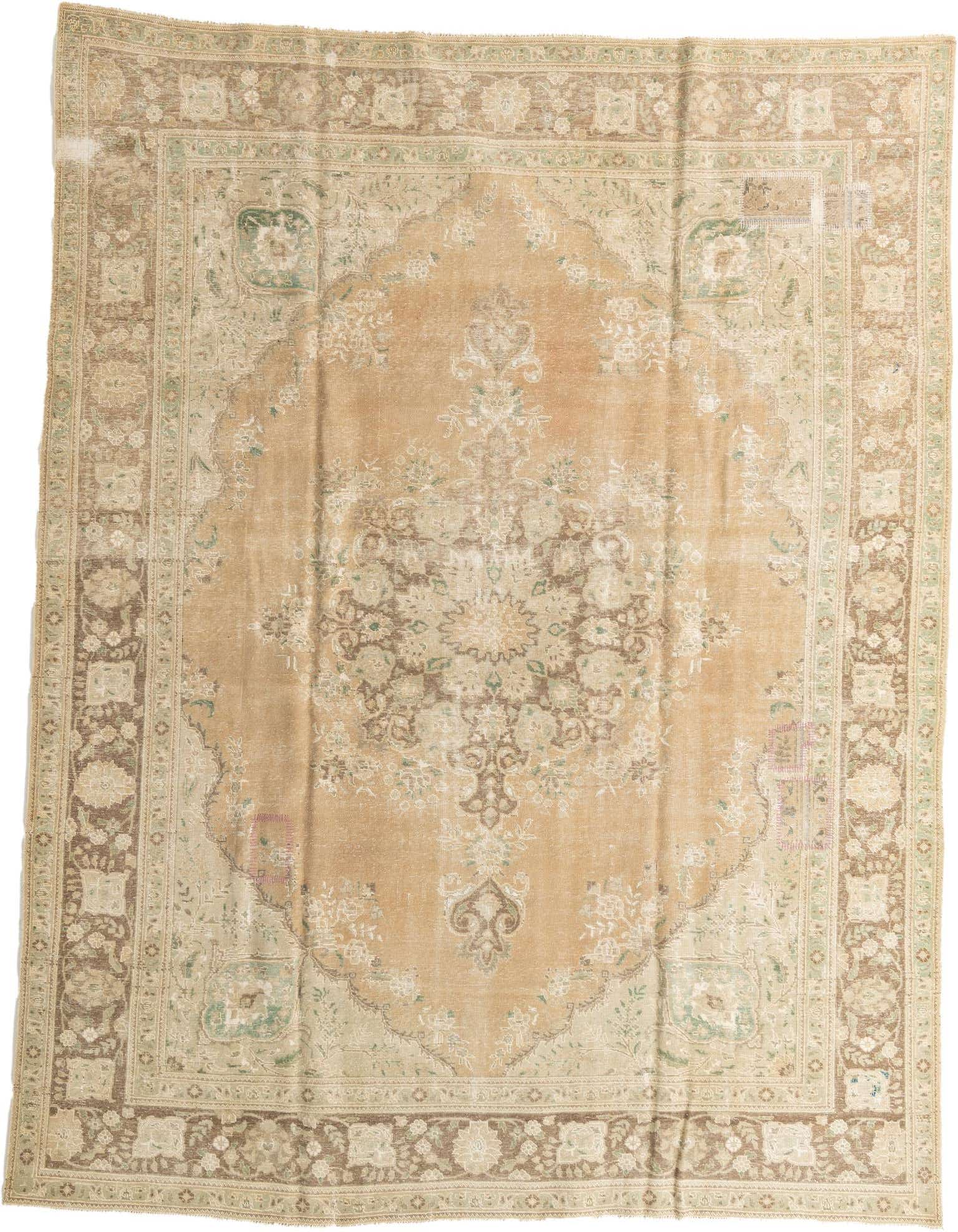 A 10x13 rectangular brown and cream Persian rug with an ornate medallion pattern, suitable for a living room.