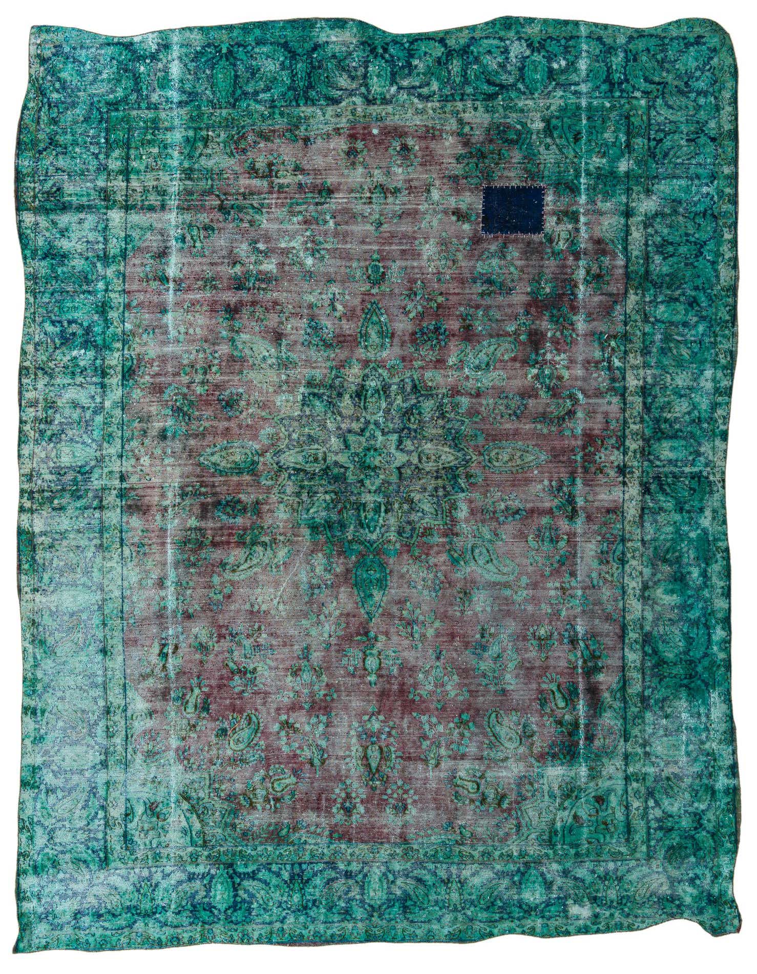 A 10x13 rectangular Ultra Vintage rug featuring a faded Persian medallion pattern in brown, tan, and cream tones with teal green accents and a dark blue patch.