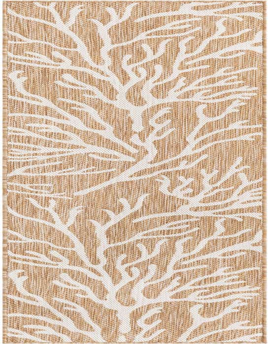 A long runner rug with a modern coastal pattern featuring white coral branches on a textured tan background, suitable for hallways or patios.