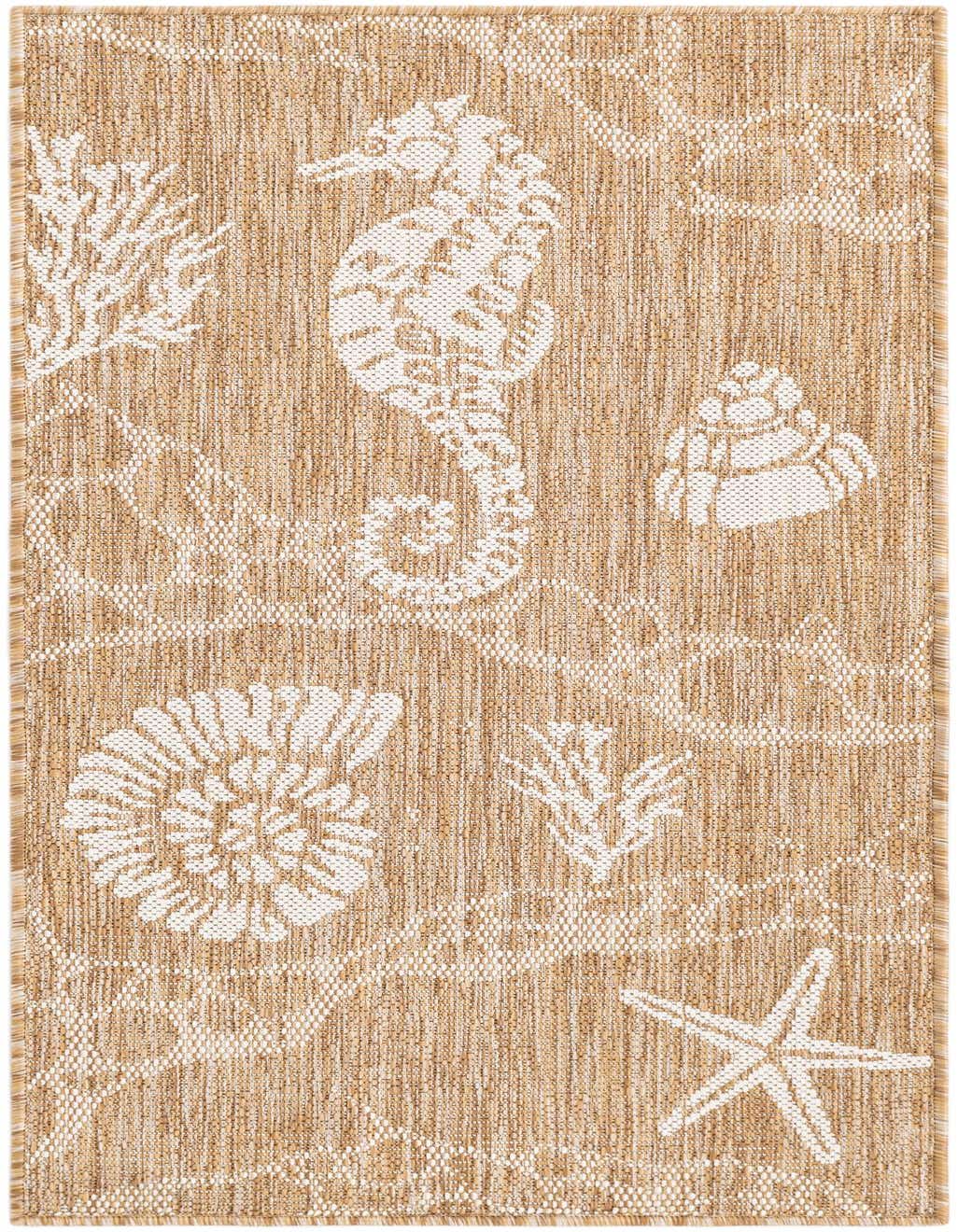 A 4 ft runner rug in tan and ivory with a coastal pattern featuring a seahorse, starfish, and seashells.