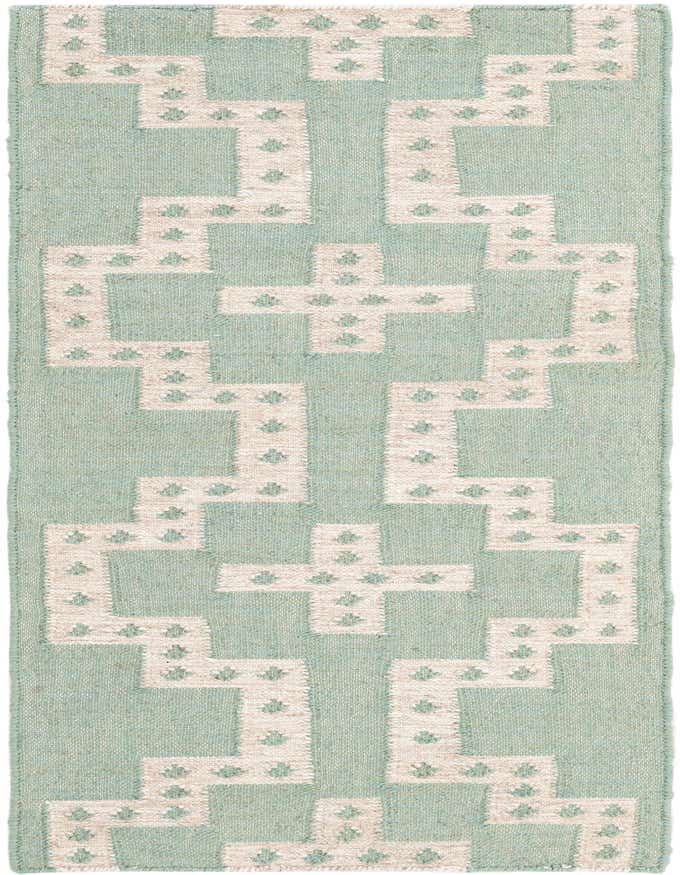 A 6 ft runner rug featuring a tribal geometric pattern in light blue and cream, ideal for a hallway.