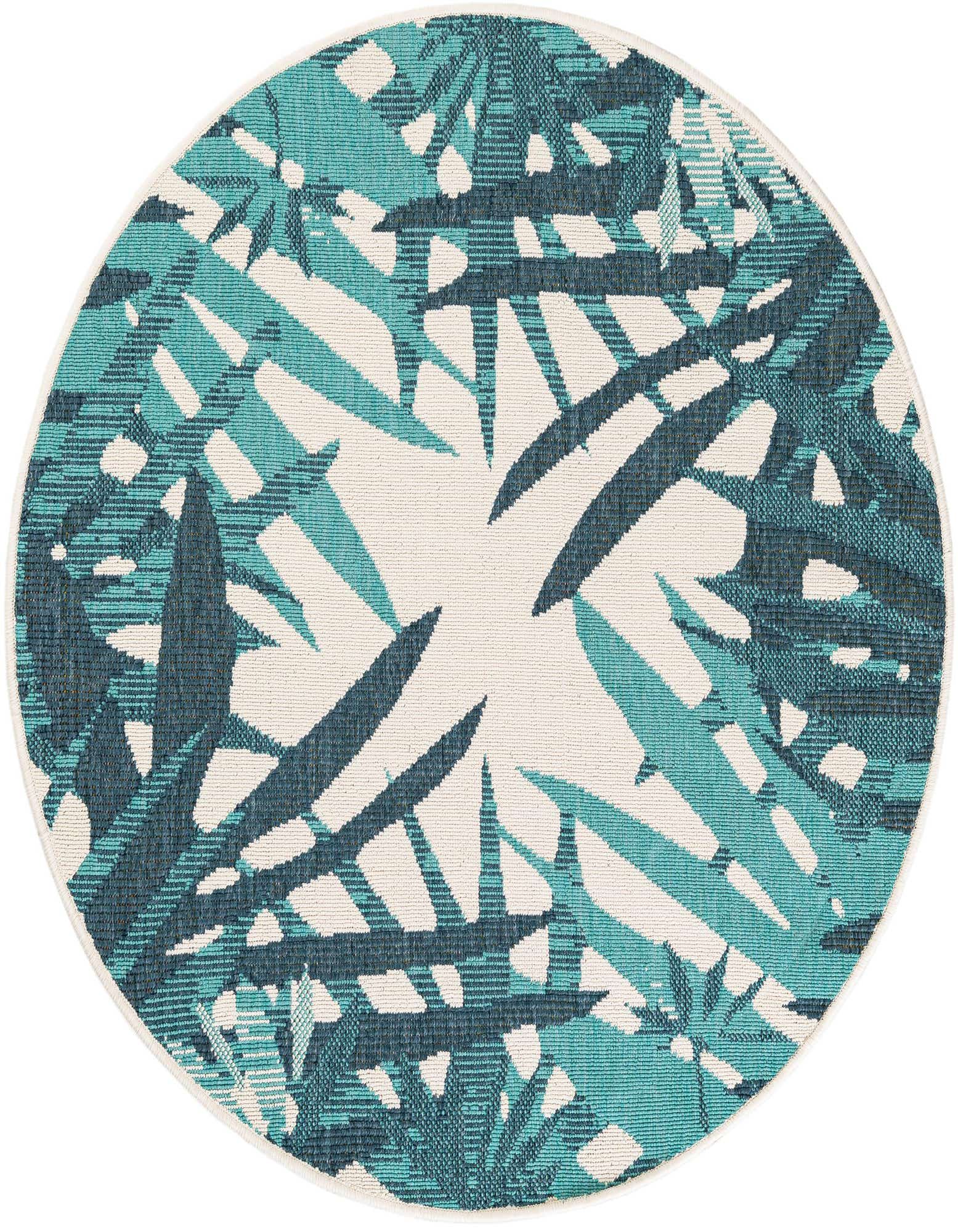 A round teal blue and cream rug with a modern floral pattern, featuring large tropical leaves, suitable for a patio.