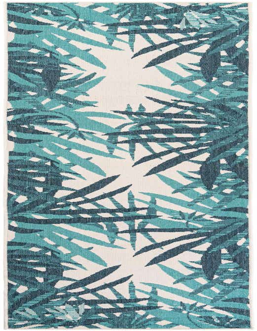 A 10 ft runner rug featuring a modern teal blue botanical pattern of large leaves on a cream background, suitable for a hallway or patio.