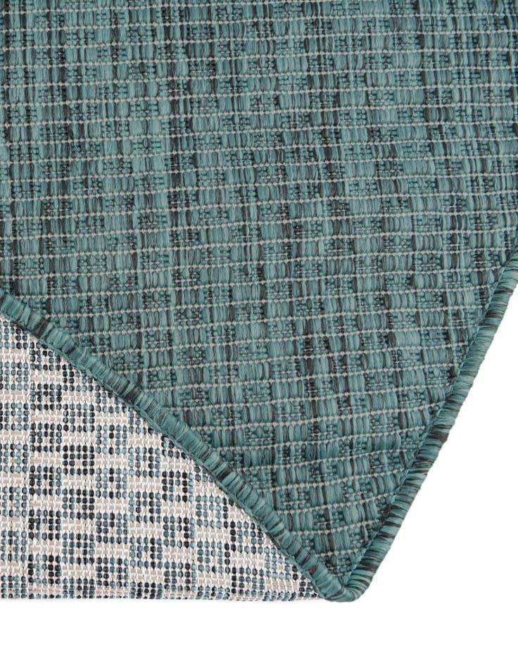 Detail image of  4' 1 x 6' 1  Washable Solid Indoor / Outdoor Oval Rug