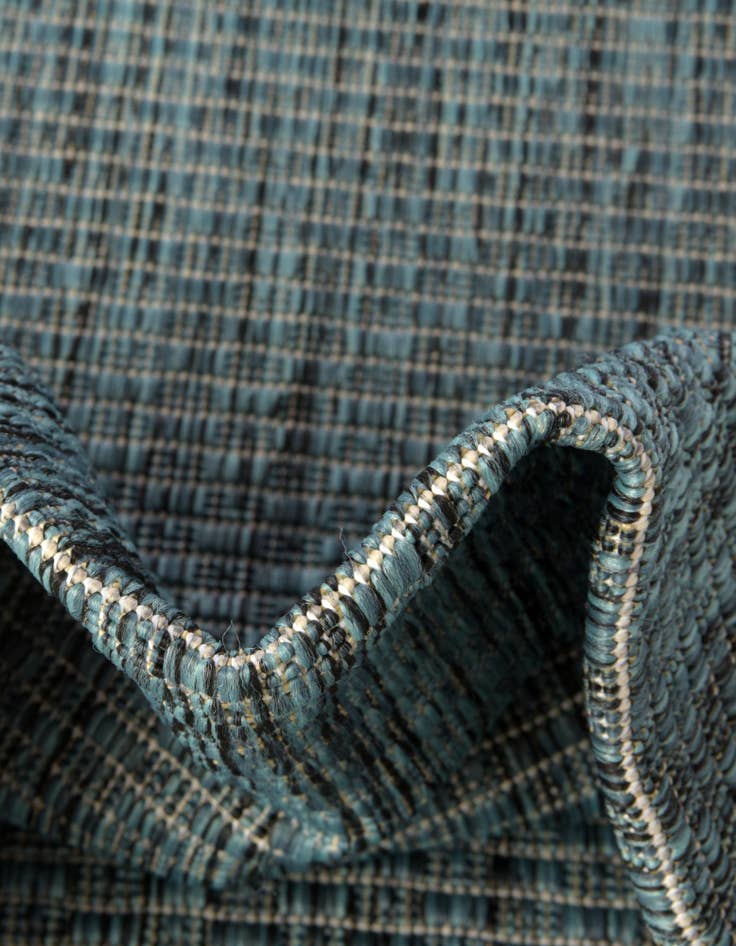 Detail image of  4' 1 x 6' 1  Washable Solid Indoor / Outdoor Oval Rug