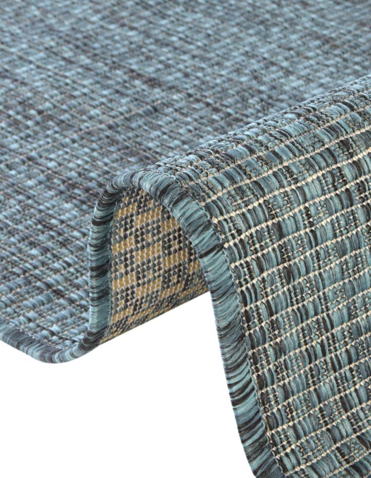 Detail image of  4' 1 x 6' 1  Washable Solid Indoor / Outdoor Oval Rug