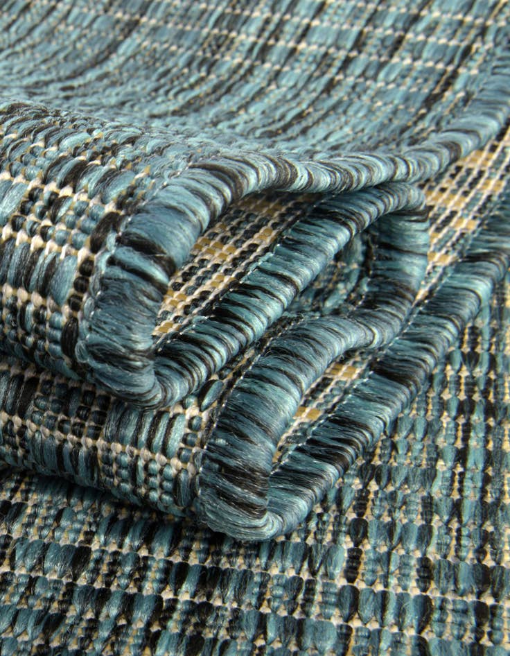 Detail image of  4' 1 x 6' 1  Washable Solid Indoor / Outdoor Oval Rug