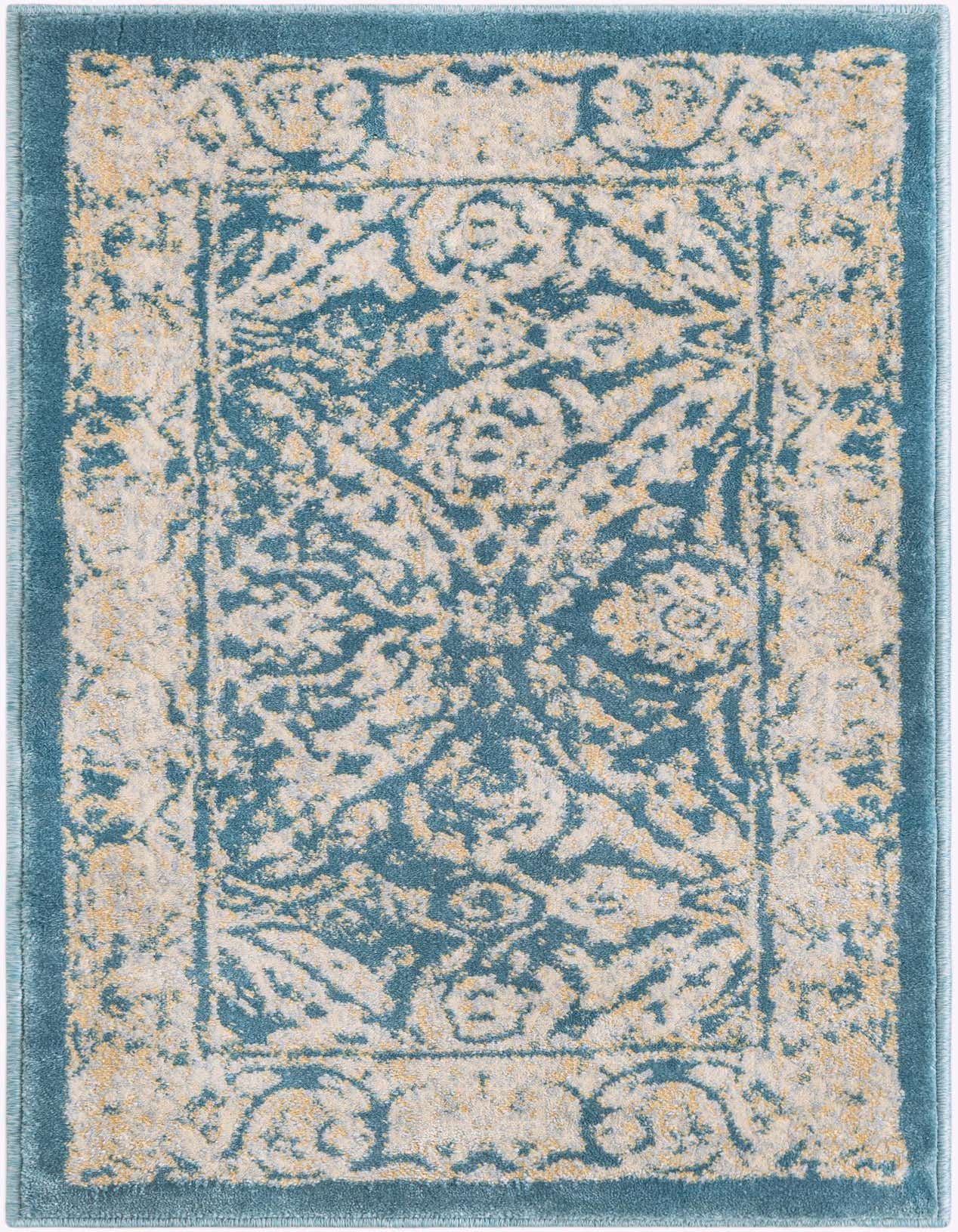 A 2x3 rectangular Dahlia rug featuring a distressed traditional pattern in teal blue and cream with hints of gold, ideal for an entryway.