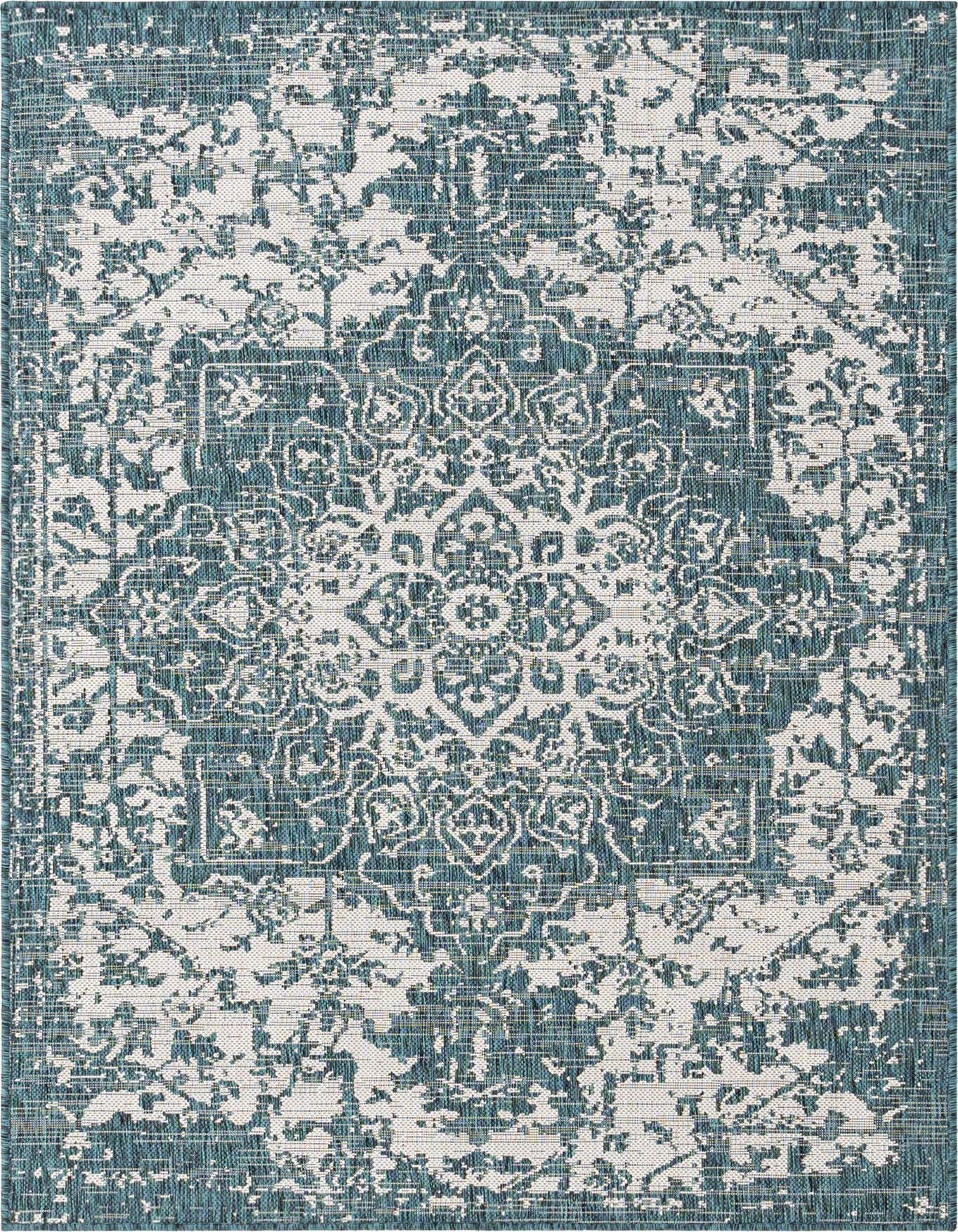 A 4x6 rectangular blue and white indoor/outdoor rug with a distressed Mediterranean medallion pattern.