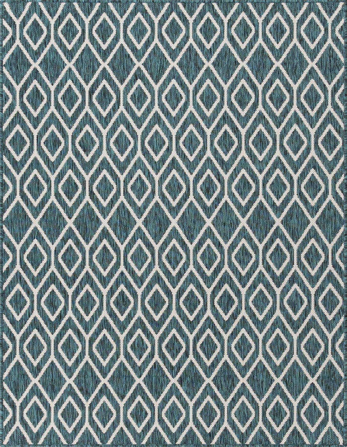 A 4x6 rectangular indoor/outdoor rug featuring a repeating geometric trellis pattern in white against a teal blue background.