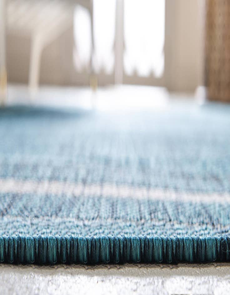 Detail image of  9' x 12'  Washable Border Indoor / Outdoor Rug