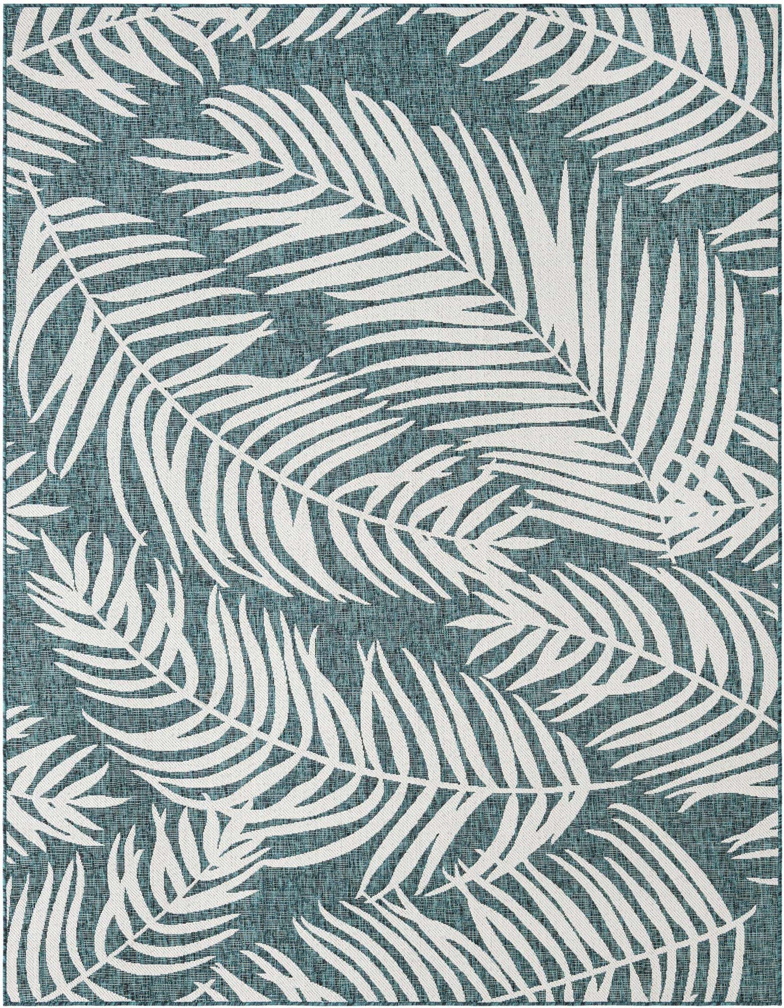 An 8x10 rectangular indoor/outdoor rug featuring a vibrant blue-green background with large, white botanical palm leaf patterns.
