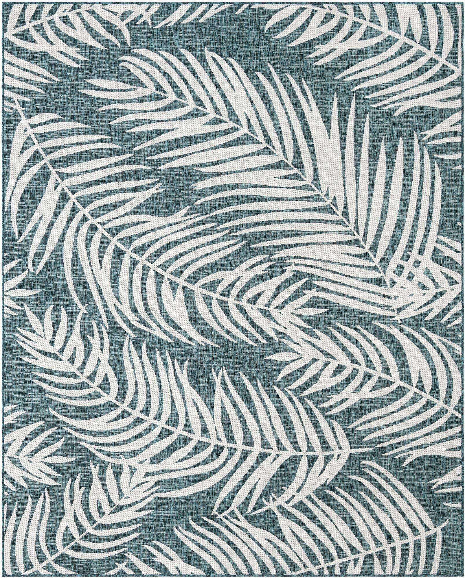 An 8x10 rectangular indoor/outdoor rug featuring a vibrant blue-green background with large, white botanical palm leaf patterns.