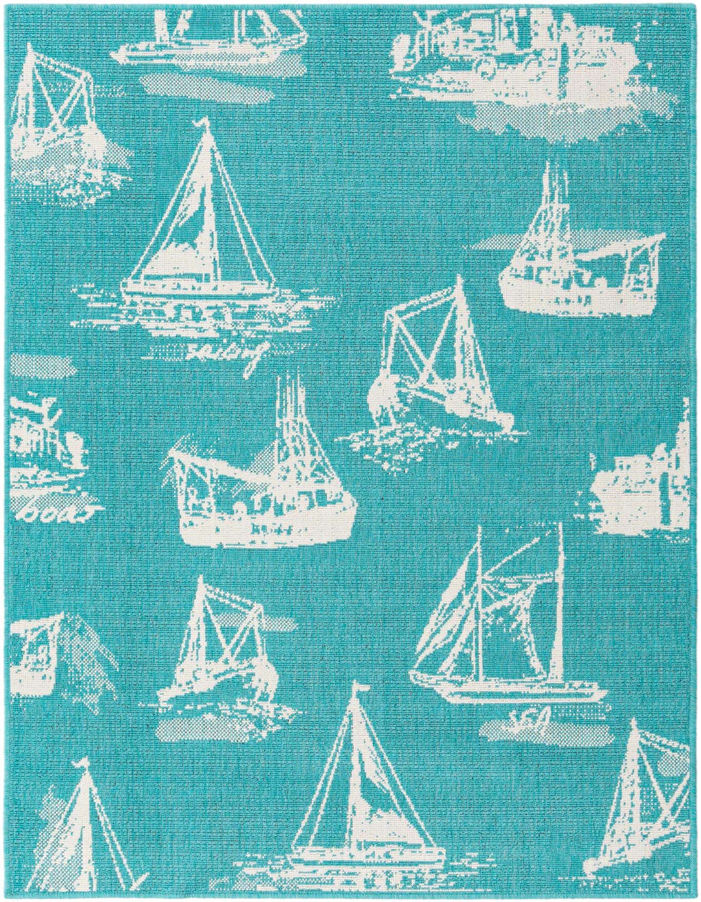 A 4x6 rectangular blue and white indoor/outdoor rug featuring a modern pattern of various white sailboats on a blue background.