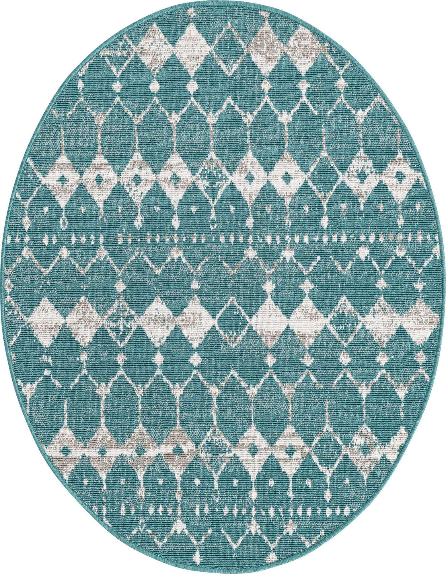 A 4' round blue and green transitional outdoor rug with a distressed geometric lattice and bohemian pattern.