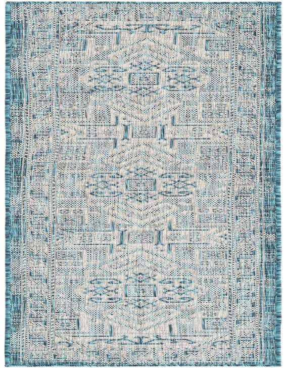 A long 8 ft runner rug with a flatweave texture, featuring a Southwestern geometric pattern in shades of blue and green.