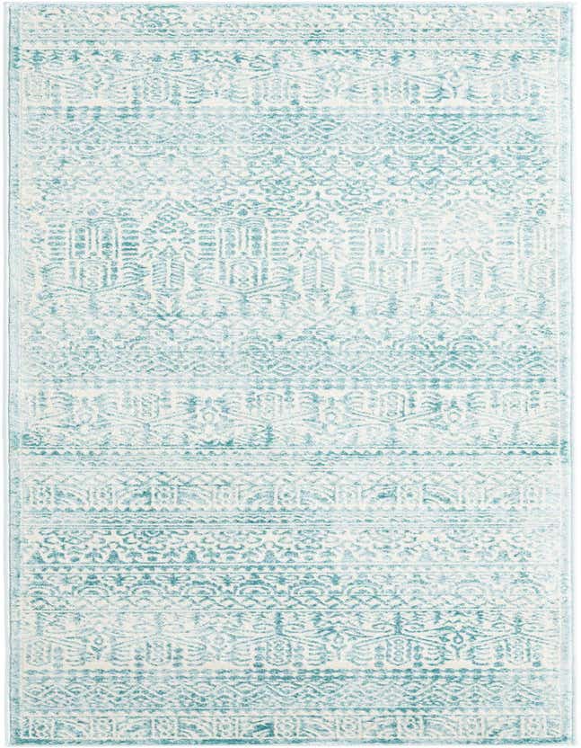An 8 ft runner rug from the Uptown Collection featuring a distressed oriental pattern in shades of blue and green on a cream background.