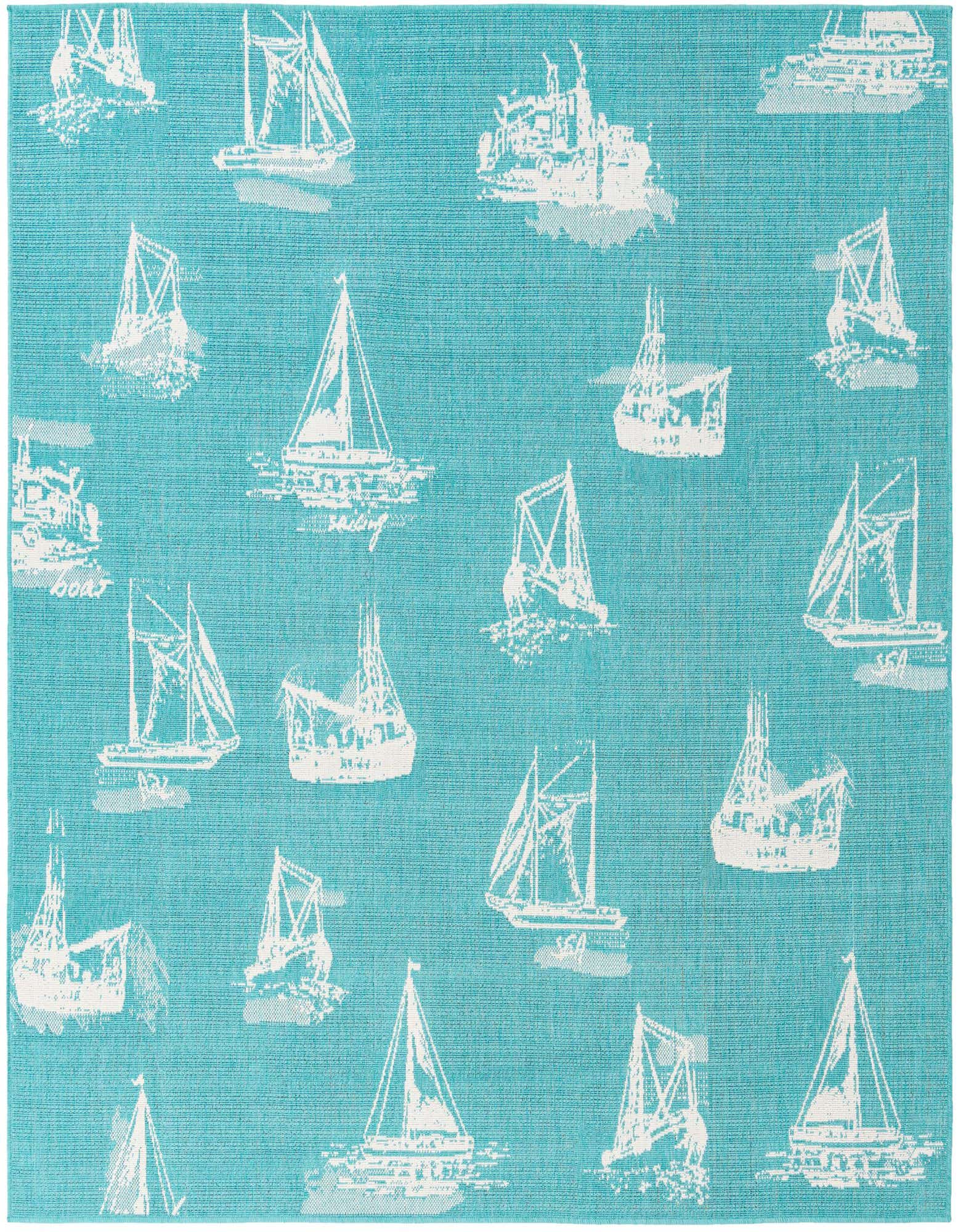 A square blue and green flatweave rug with a repeating pattern of white sailboats and nautical elements, suitable for indoor or outdoor use.