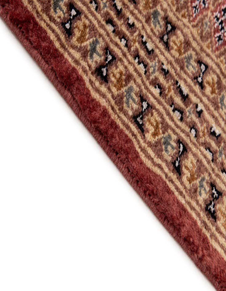 Detail image of  4' 3 x 5' 11  Hand Knotted Bokhara Oriental Rug