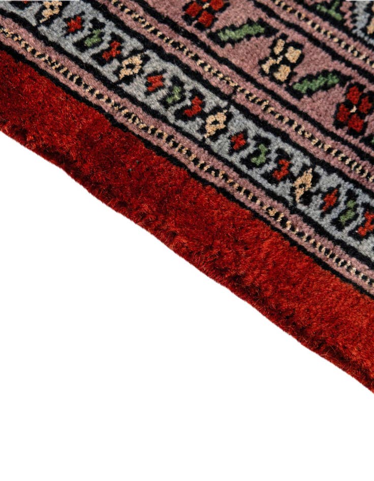 Detail image of  4' 2 x 5' 9  Hand Knotted Bokhara Oriental Wool Rug