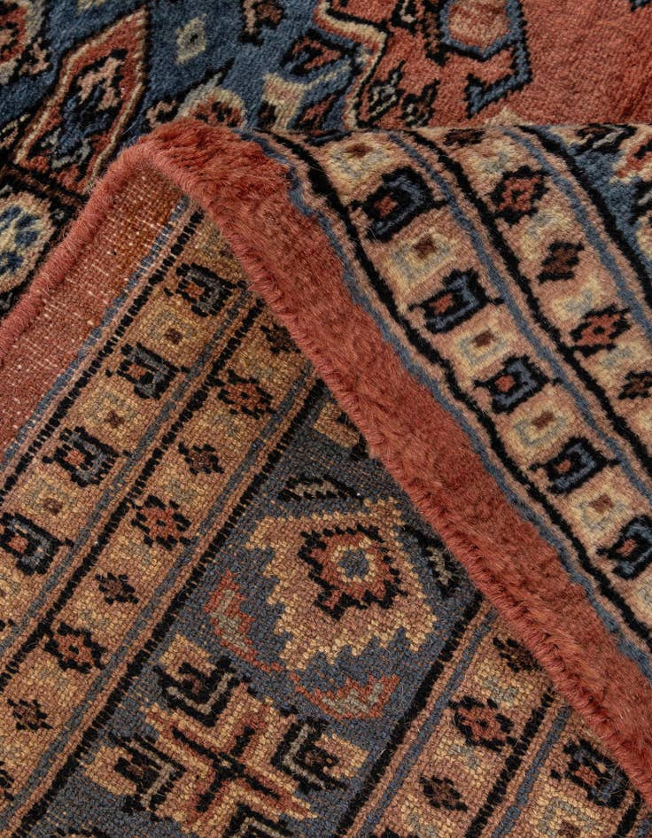 Detail image of  4' 2 x 6' 2  Hand Knotted Bokhara Oriental Wool Rug