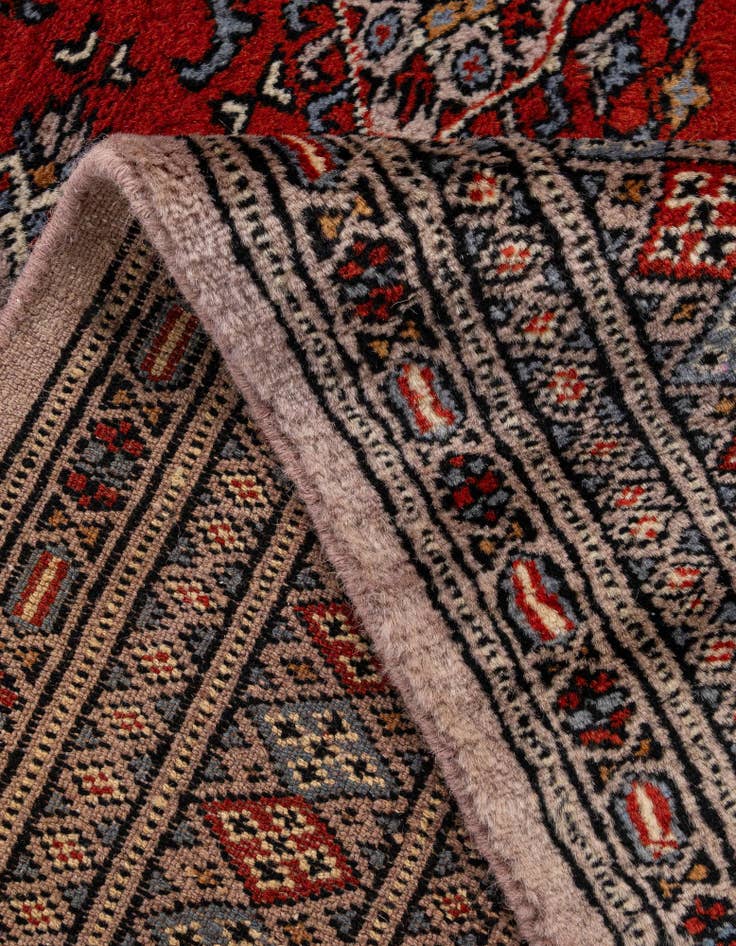 Detail image of  4' 2 x 6' 5  Hand Knotted Bokhara Oriental Wool Rug