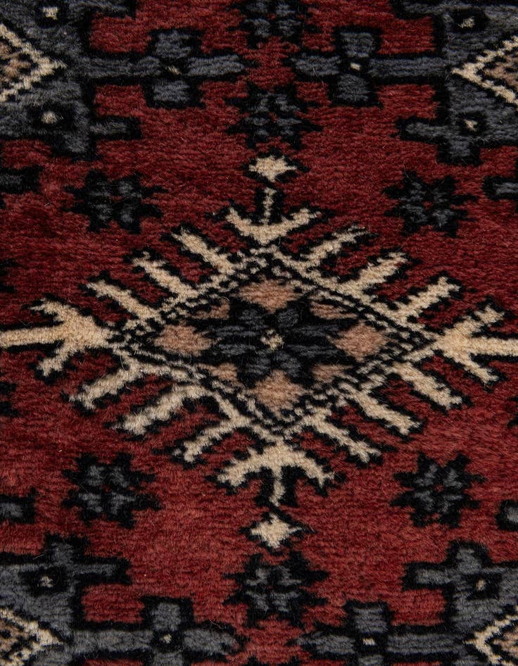 Detail image of  4' 2 x 5' 11  Hand Knotted Bokhara Oriental Wool Rug