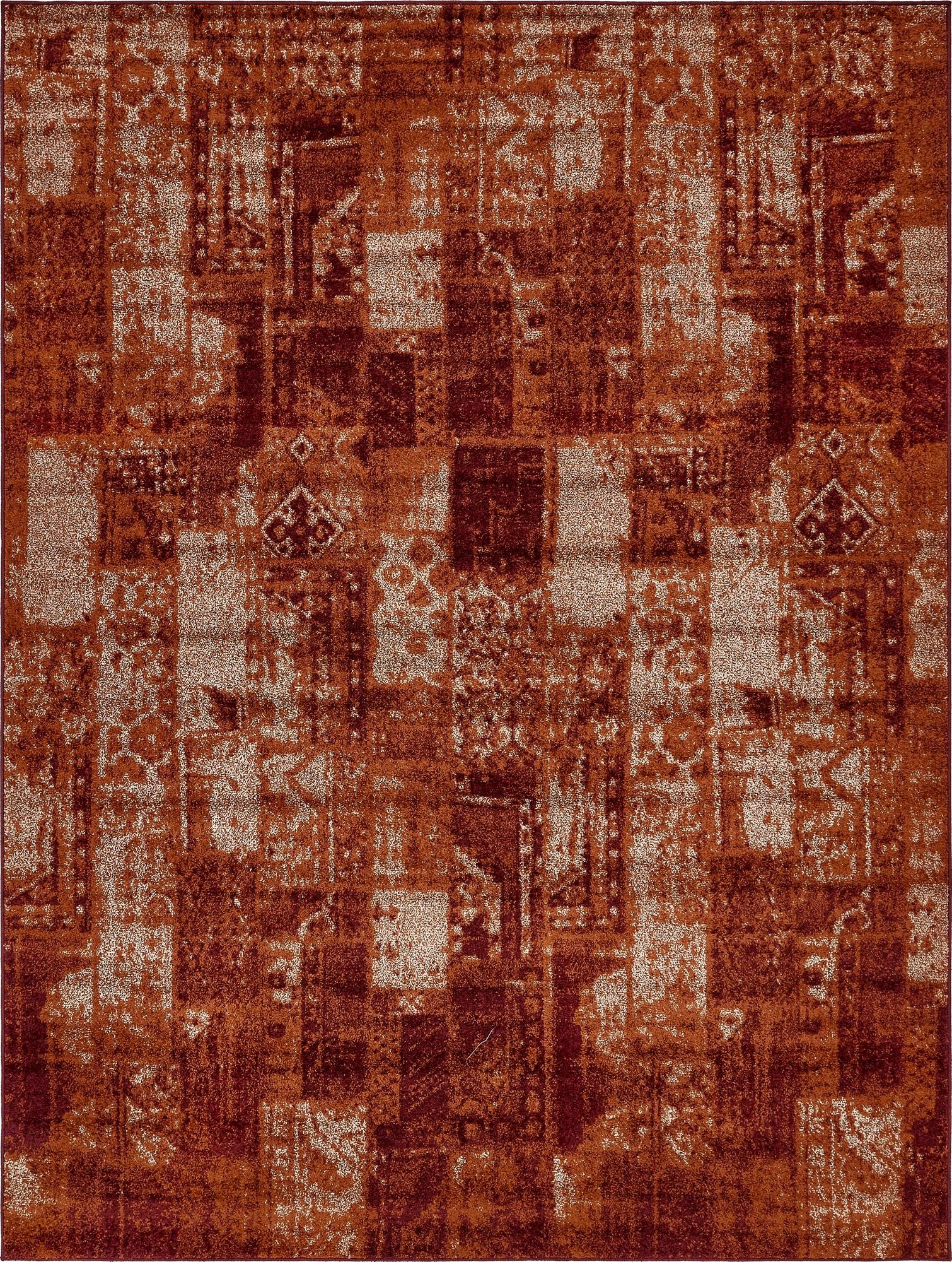 A 9x12 rectangular Southwestern rug in shades of orange and red with a distressed, abstract pattern, perfect for a living room.