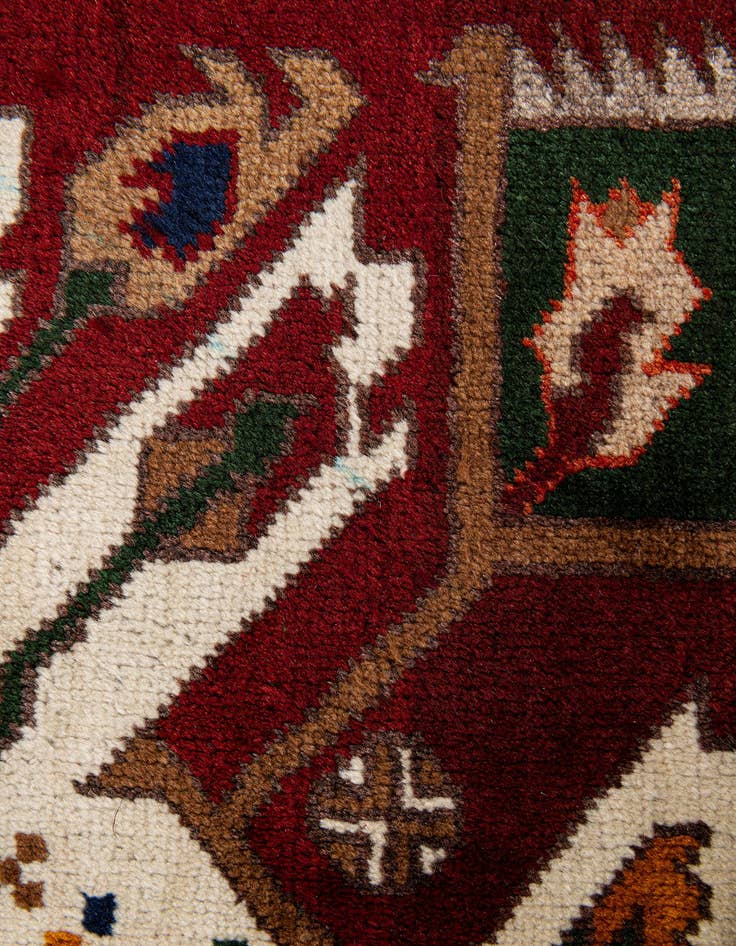 Detail image of  4' 10 x 7' 5  Hand Knotted Heriz Wool Rug