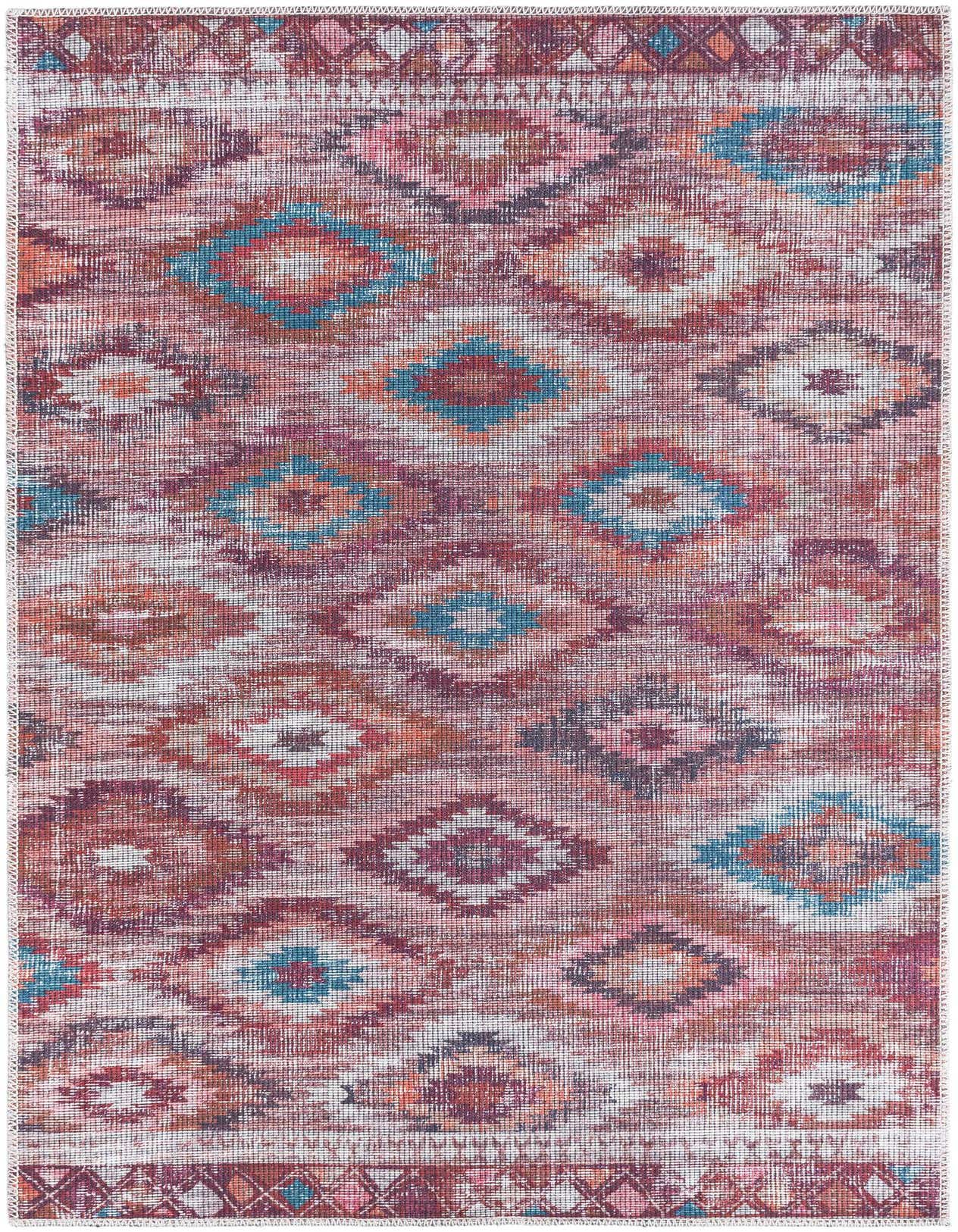 A 3x5 rectangular Sisu rug with a distressed Southwestern and tribal pattern in oranges, reds, and teal, suitable for a patio.