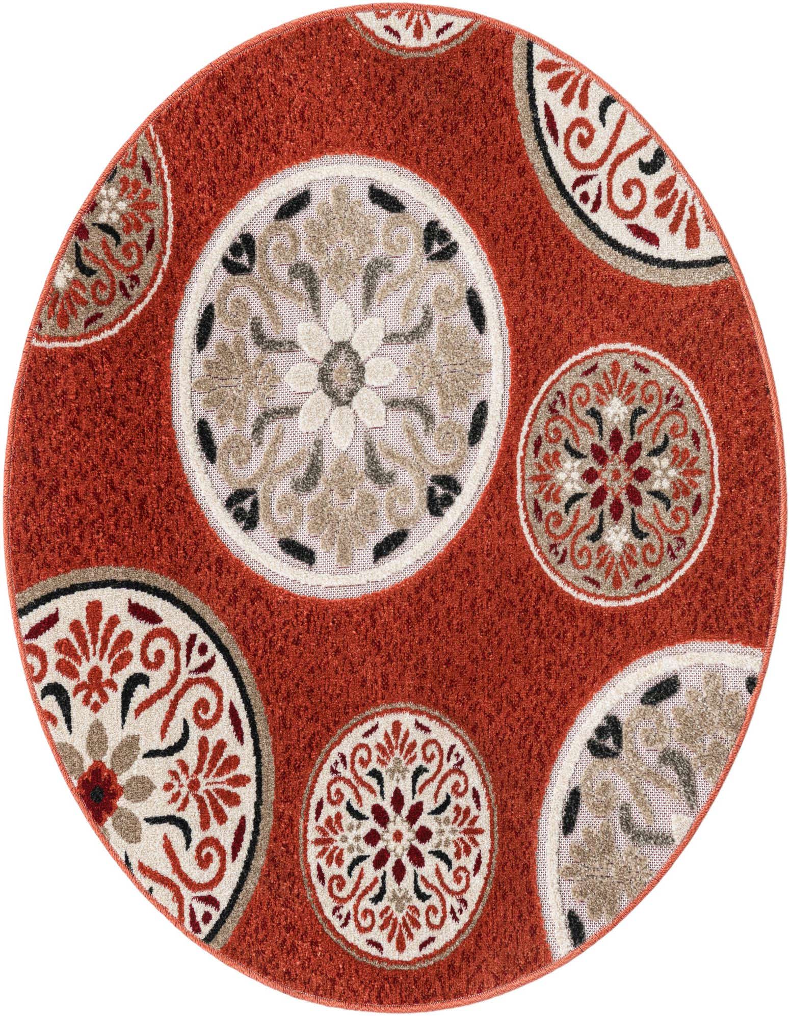 A 4' round orange indoor/outdoor rug with a modern botanical pattern of large and small medallions in cream, beige, black, and red.