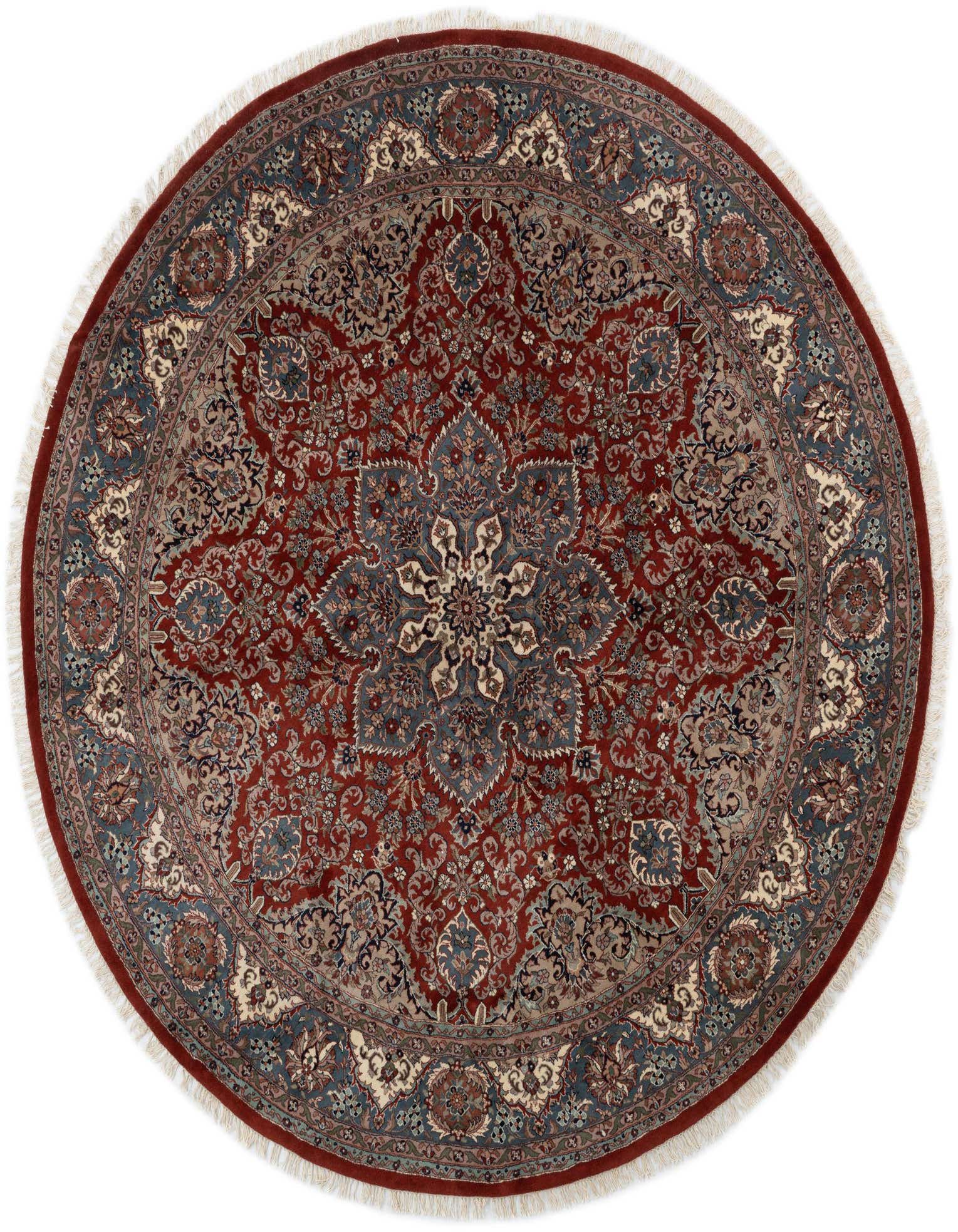 A round 9' 0 x 9' 0 orange and red traditional wool rug with an intricate medallion pattern.
