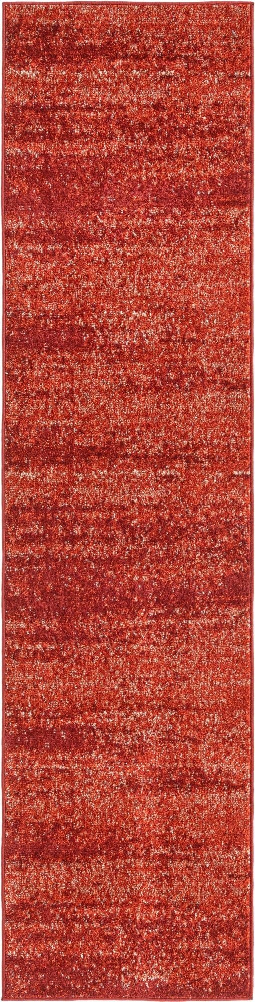 A vibrant 8 ft runner rug in shades of orange and red, featuring a textured, contemporary solid pattern, ideal for a hallway or kitchen.