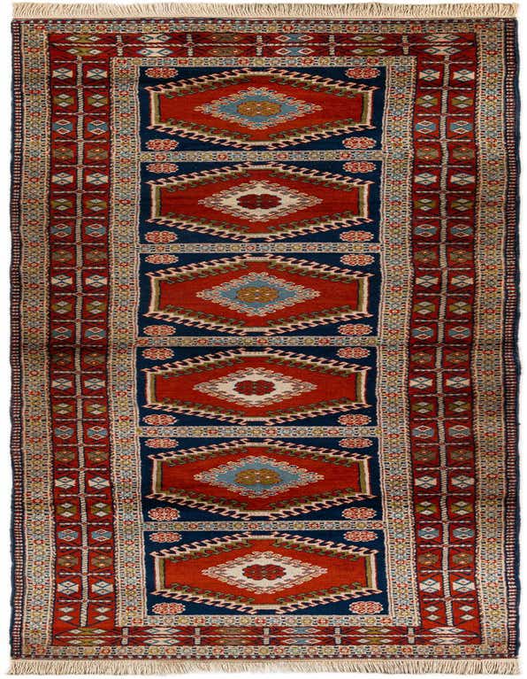 A handmade 11 ft runner rug with a traditional tribal pattern in oranges, reds, and deep blue, ideal for a hallway.