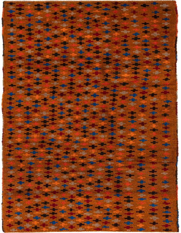 A 10 Ft Balouch runner rug in orange, featuring a repeating pattern of small tribal crosses in red, blue, black, and beige.