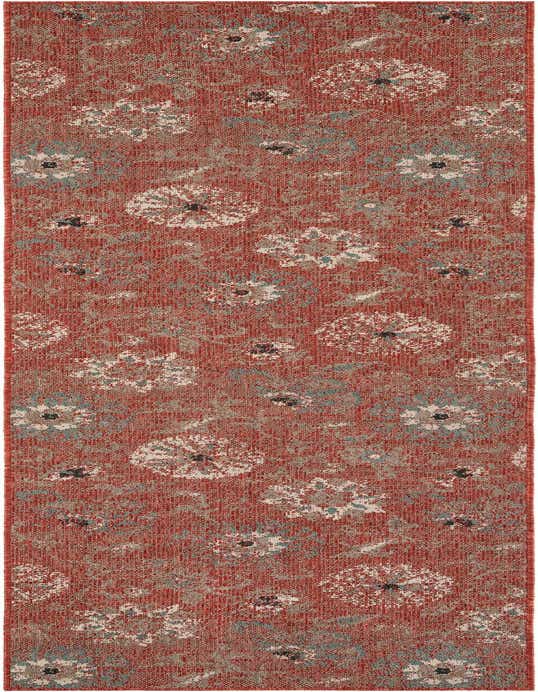 A 10 ft runner rug from the Rugs.com Outdoor Botanical collection, featuring a modern floral pattern in shades of orange, red, and subtle blue on a flatweave texture.