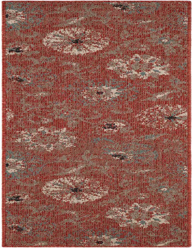 A 6 ft runner rug with a modern floral pattern in shades of orange, red, and cream, suitable for indoor or outdoor use.