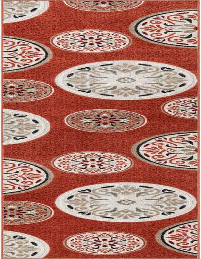 A 12 ft orange runner rug with a modern botanical pattern of large and small medallions in red, black, and beige.