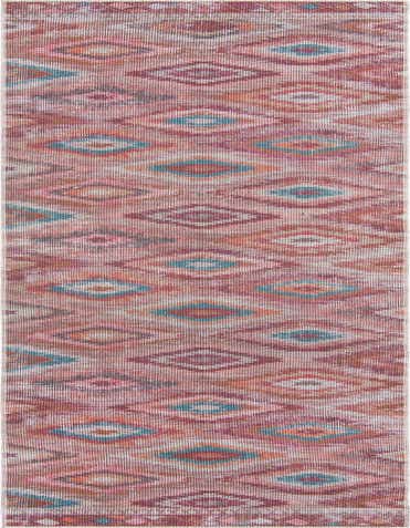 A 14 ft runner rug featuring a faded Southwestern tribal pattern in oranges, reds, and teal, perfect for a hallway.