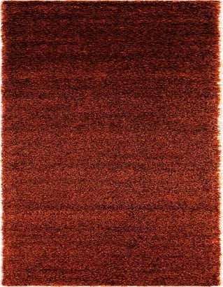 A long, rectangular 16 ft runner rug in a rich, solid orange-red color with a plush shag pile.
