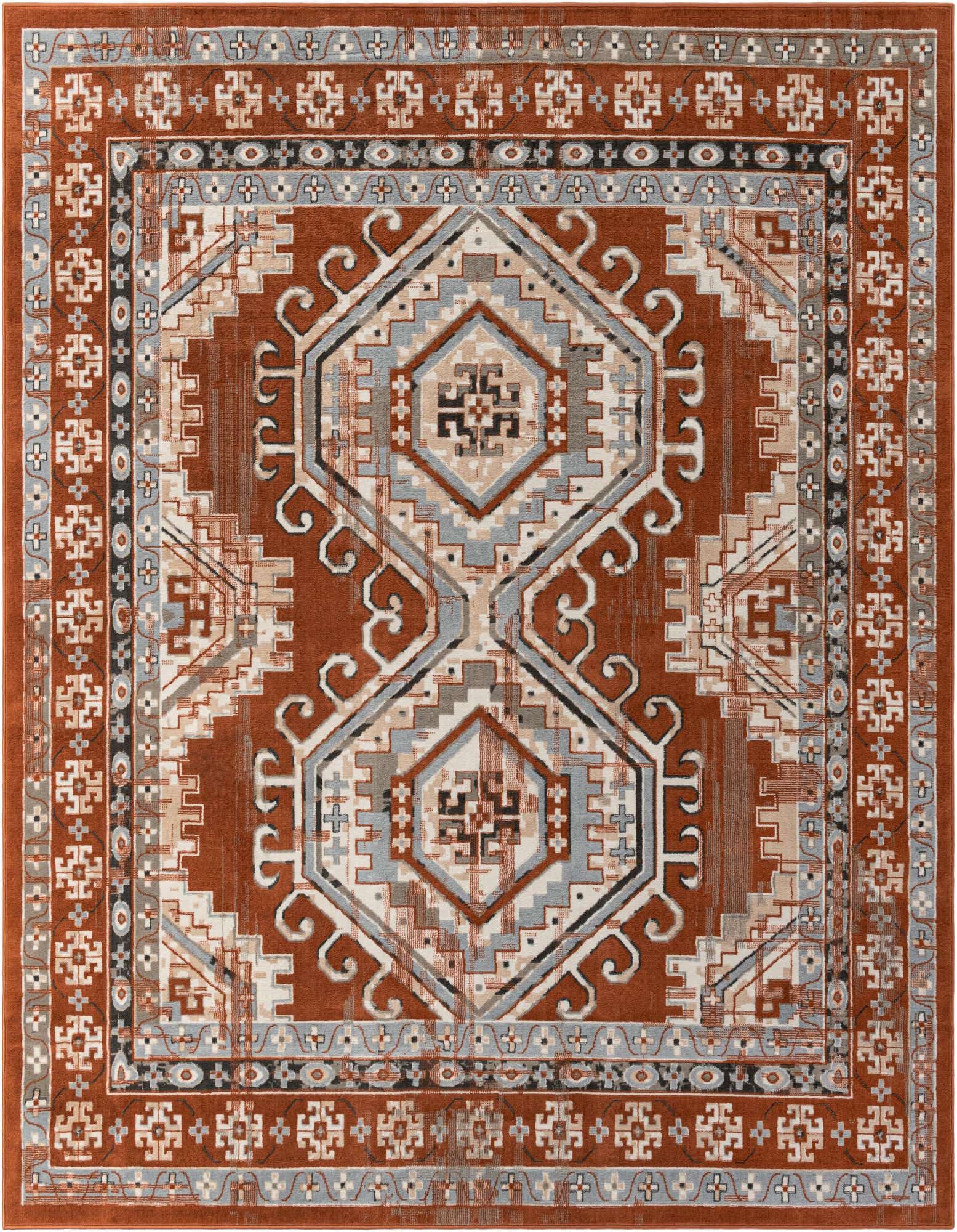 A 10' square Charlotte Southwestern rug in shades of orange, red, grey, and cream, featuring a tribal geometric pattern.