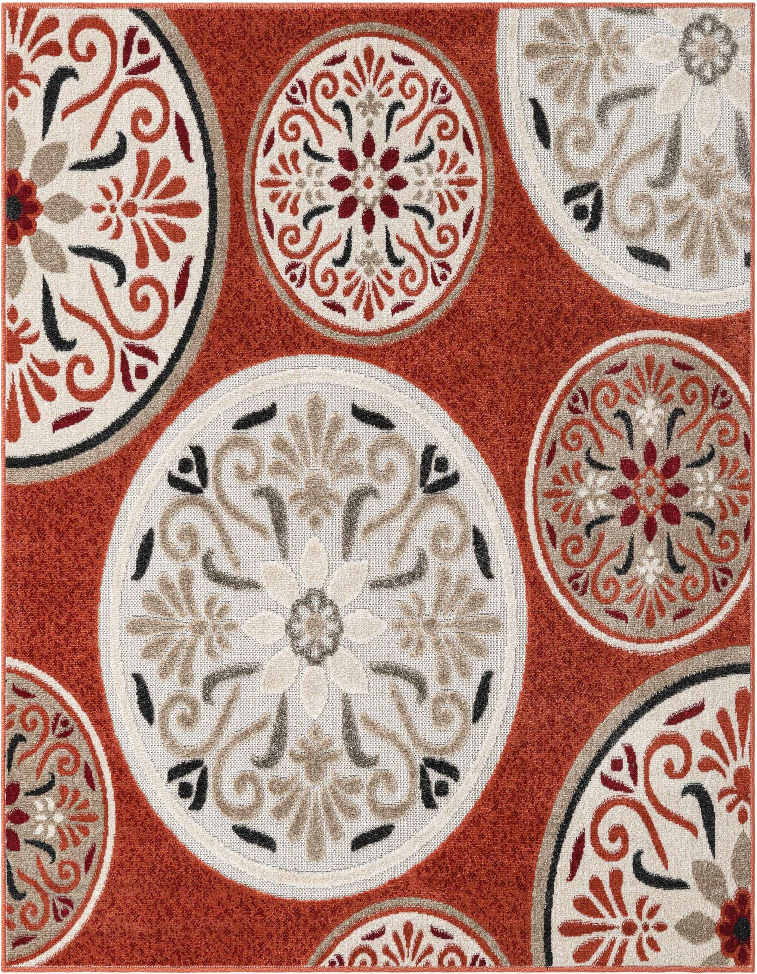 A 5' 3 x 5' 3 square orange outdoor rug featuring large and small white, red, and black botanical medallions.