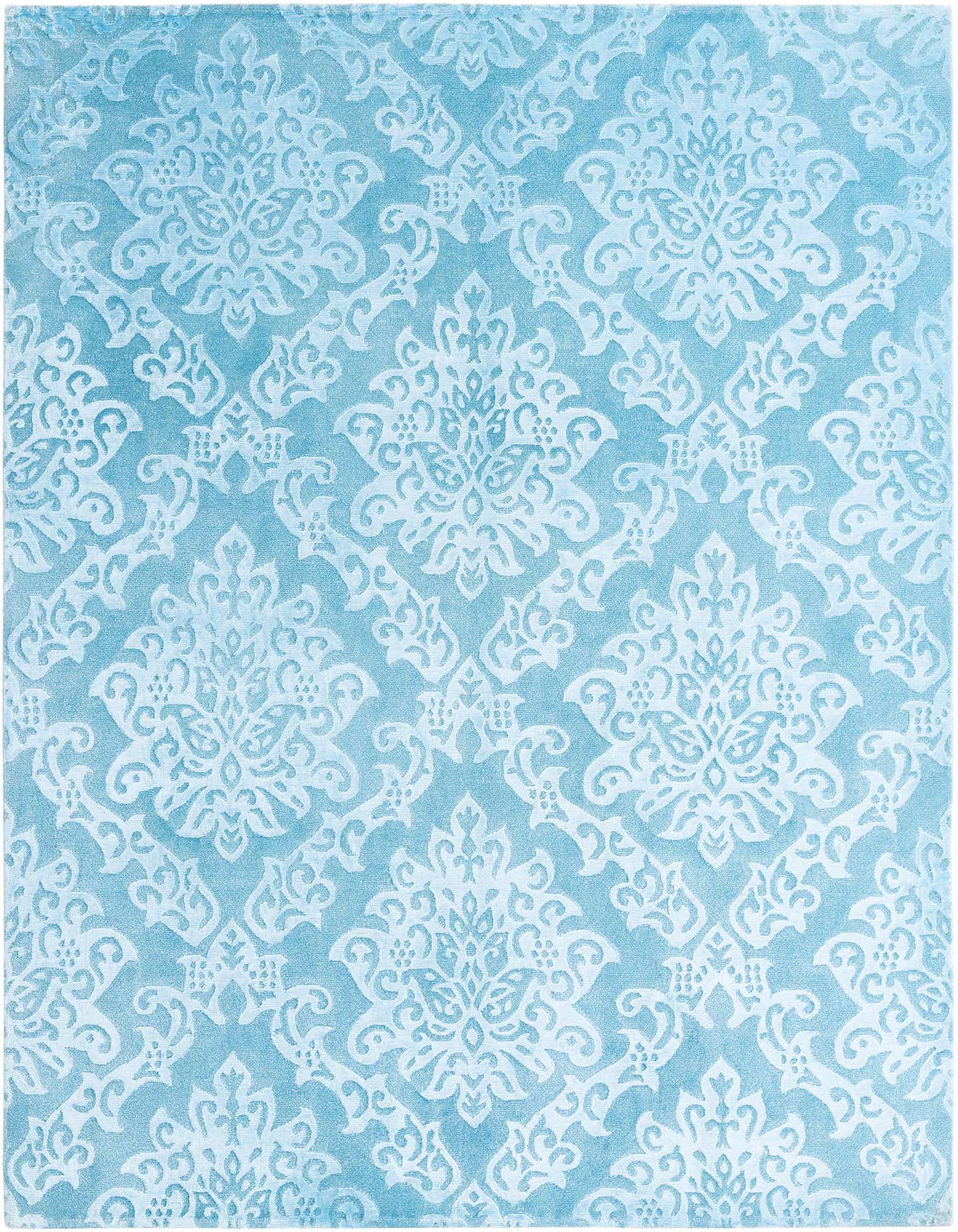 A 5x8 rectangular Darya rug by Rugs.com features a light blue background with an intricate white modern oriental pattern, showcasing its high pile and handmade wool texture.