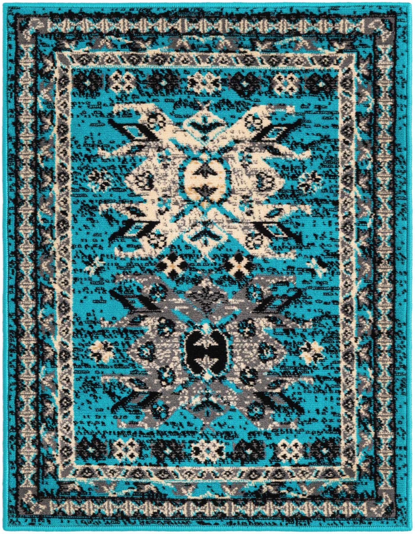 A rectangular 2x3 Heris rug in vibrant blue with a traditional Southwestern medallion pattern in black, grey, and cream.