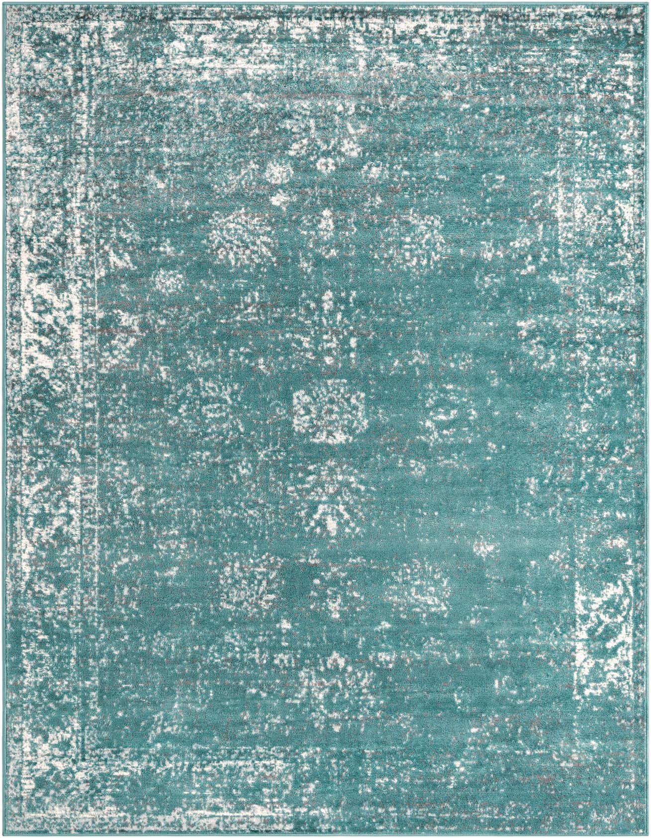 A 5x8 rectangular Monte Carlo rug in varying shades of blue with a distressed white medallion and border pattern.