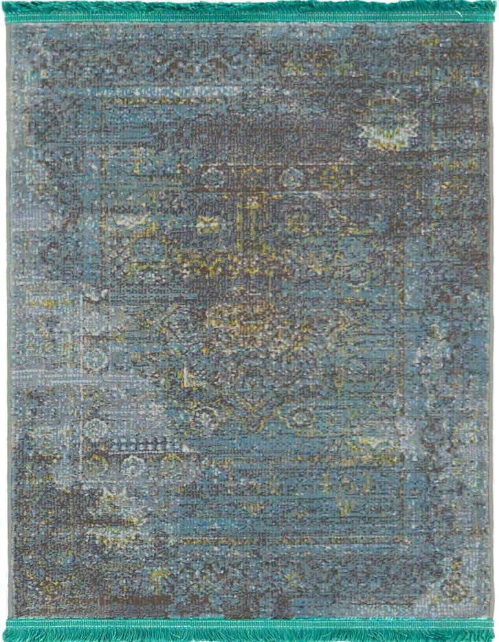 A 2x3 rectangular Santiago rug featuring a distressed medallion pattern in varying shades of blue, grey, and hints of yellow, with short fringe.